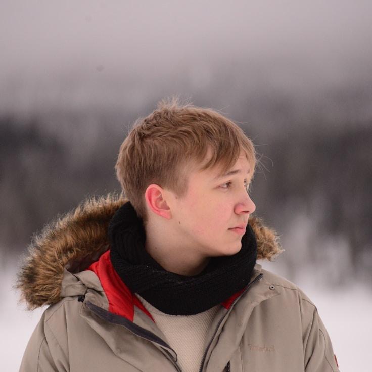 Kaveri Mehta, Lead Design Curator at Rising Mirror Solace, reviewing corporate floral arrangements